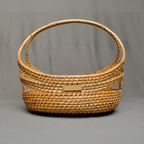 Stock Keeper - Sculptural Oval Rattan Basket with Arch Handle