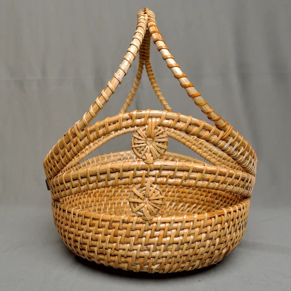 Stock Keeper - Sculptural Oval Rattan Basket with Arch Handle
